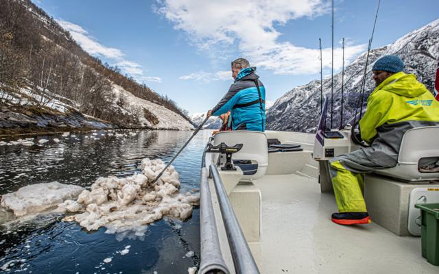 Captain Tor and Miss Fjords with guests on a photo assignment in Fjærlandsfjorden, winter