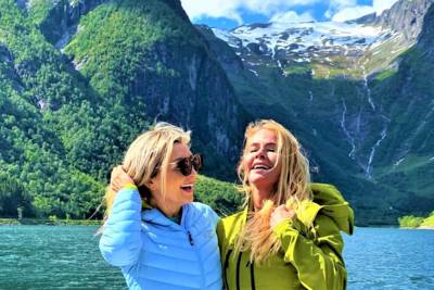 "CEO of Visit Sognefjord, Heidi Hauge, experiencing the 'Human Edge' and the serene 'Hyper-nature' of Finnabotn with Balestrand Fjord Angling. A high-end, sustainable fjord tour in the Sognefjord, showcasing authentic Norwegian travel and the emotional power of the pristine landscape."