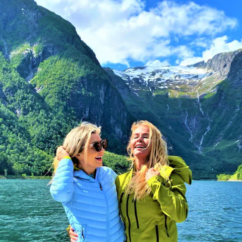 "CEO of Visit Sognefjord, Heidi Hauge, experiencing the 'Human Edge' and the serene 'Hyper-nature' of Finnabotn with Balestrand Fjord Angling. A high-end, sustainable fjord tour in the Sognefjord, showcasing authentic Norwegian travel and the emotional power of the pristine landscape."