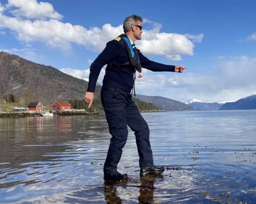 Captain Tor and Miss Fjords boat in Balestrand harbor